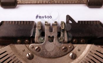 Vintage inscription made by old typewriter, #Metoo as a new movement worldwide - Against harassment of women