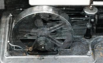 Vintage steam engine, selective focus on the wheel