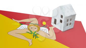 Small house on a flag - Living or migrating to Sicily
