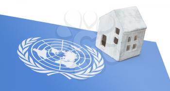 Small house on a flag - The United Nations
