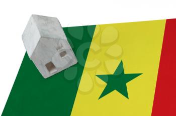 Small house on a flag - Living or migrating to Senegal