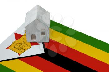 Small house on a flag - Living or migrating to Zimbabwe