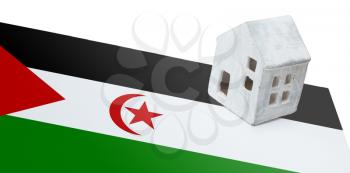 Small house on a flag - Living or migrating to Western Sahara