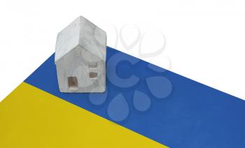 Small house on a flag - Living or migrating to Ukraine