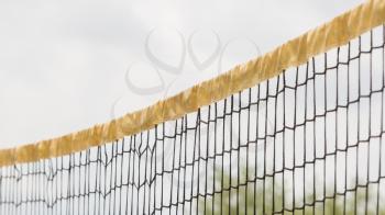 Yellow volleyball net, playing outdoor, selective focus