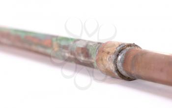 Old brass pipe, isolated on a white background