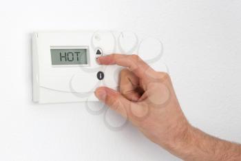 Vintage digital thermostat - Hot - Man adjusting the temperature