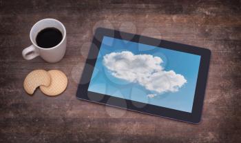 Cloud-computing connection on a digital tablet pc, vintage setting