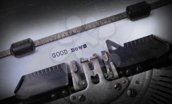 Vintage inscription made by old typewriter, GOOD news