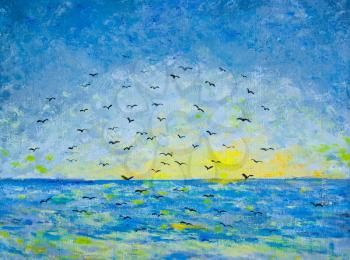 Sunset at the sea, birds in the sky, blue