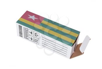 Concept of export, opened paper box - Product of Togo