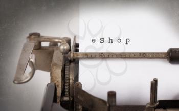 Close-up of an old typewriter with paper, perspective, selective focus, eShop