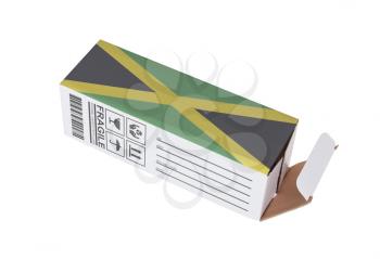 Concept of export, opened paper box - Product of Jamaica
