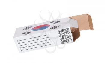 Concept of export, opened paper box - Product of South Korea