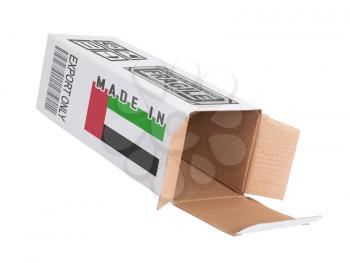 Concept of export, opened paper box - Product of the United Arab Emirates