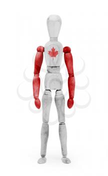 Wood figure mannequin with flag bodypaint on white background - Canada
