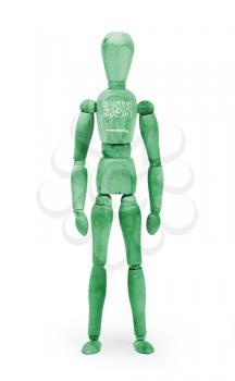 Wood figure mannequin with flag bodypaint on white background - Saudi Arabia