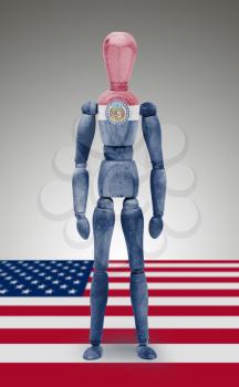 Old wood figure mannequin with US state flag bodypaint - Missouri
