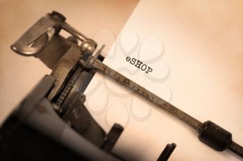 Close-up of an old typewriter with paper, perspective, selective focus, eShop