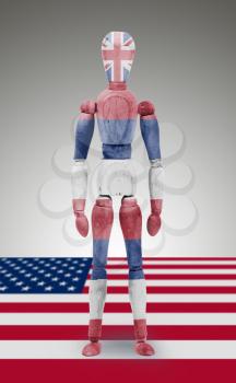 Old wood figure mannequin with US state flag bodypaint - Hawaii