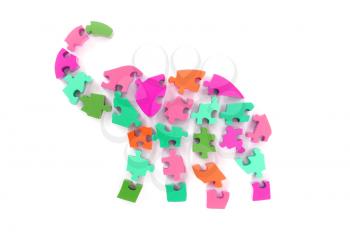 Colorful puzzle pieces in elephant shape - isolated over white