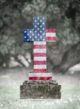 Old weathered gravestone in the cemetery - USA