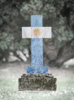 Old weathered gravestone in the cemetery - Argentina