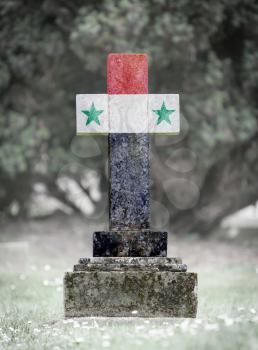 Old weathered gravestone in the cemetery - Syria