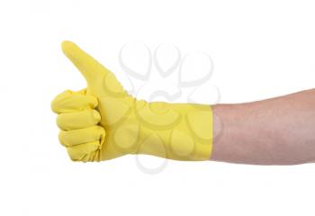 Yellow glove for cleaning show thumbs up - isolated on white
