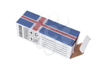 Concept of export, opened paper box - Product of Iceland