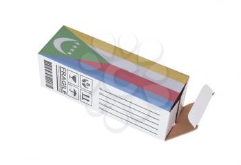 Concept of export, opened paper box - Product of Comoros