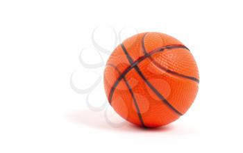 Small toy basketball ball isolated on white background
