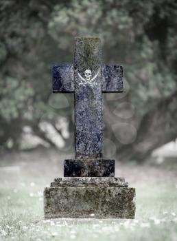 Old weathered gravestone in the cemetery - Pirate