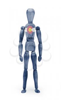 Old wood figure mannequin with US state flag bodypaint - Colorado