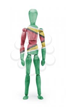 Wood figure mannequin with flag bodypaint on white background - Guyana