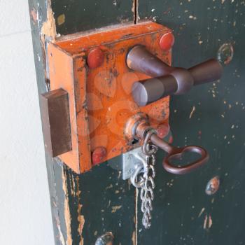 Old lock in a prison, selective focus