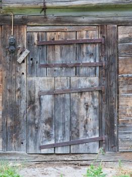 Old door in a wooden shed, Switzerland