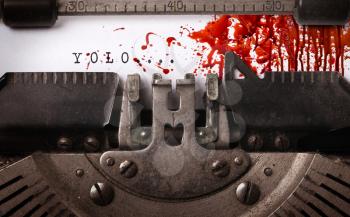 Bloody note - Vintage inscription made by old typewriter, YOLO