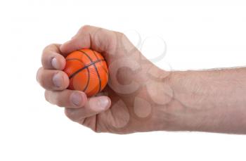 Isolated hand with a mini basket ball on a white background
