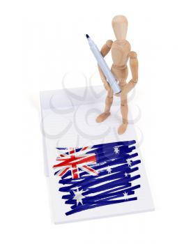 Wooden mannequin made a drawing of a flag - Australia