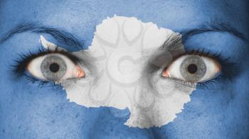 Women eye, close-up, eyes wide open, flag of Antarctica