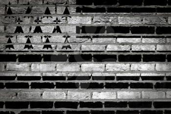 Dark brick wall texture - flag painted on wall - Brittany