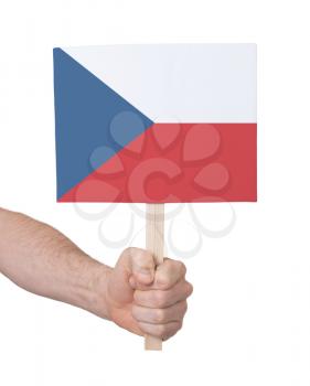 Hand holding small card, isolated on white - Flag of Czech Republic