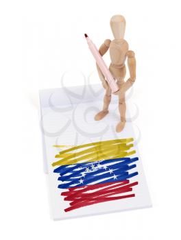 Wooden mannequin made a drawing of a flag - Venezuela
