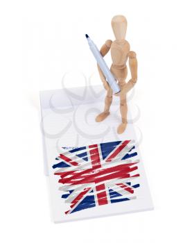 Wooden mannequin made a drawing of a flag - United Kingdom