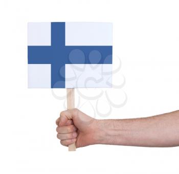 Hand holding small card, isolated on white - Flag of Finland
