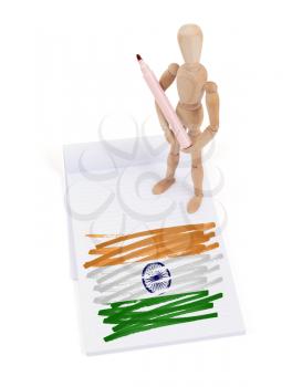 Wooden mannequin made a drawing of a flag - India