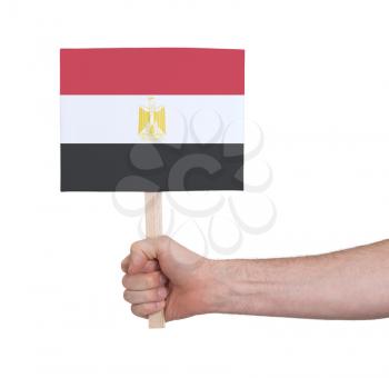 Hand holding small card, isolated on white - Flag of Egypt
