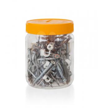 Jar filled with screws and nails, isolated on white