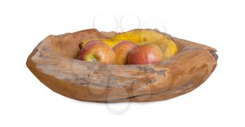 Ripe fruit assortment in a wooden bowl isolated on white